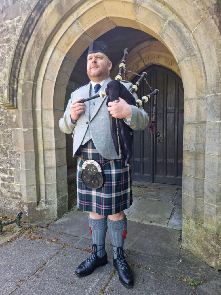 Martin The Piper with Bagpipes at Funeral